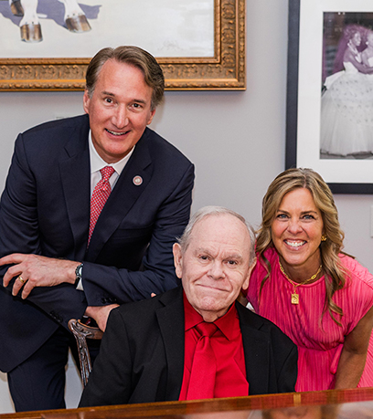 Une photo de Bob avec le gouverneur et la première dame